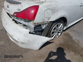 2014 Infiniti Q60 Journey z VIN JN1CV6EK4EM113805, wystawiony jako IAAI lot #42348451 z przebiegiem Nie podano mil oraz . Historia ofert i sprzedaży dostępna na DreamBid. Obrazek 13.