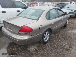 2004 Ford Taurus SE with VIN 1FAFP53U94A131211, listed as a IAAI auction lot 40930929 with 1 mi miles. Bid and sale history available at carsss.com. Image 4.