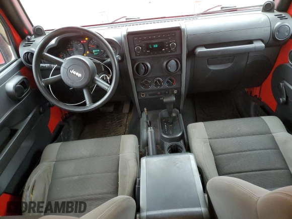 2007 Jeep Wrangler Unlimited X with VIN 1J4GA39137L111198, listed as a Copart auction lot 44244805 with 157,922 mi miles and Salvage Title. Bid and sale history available at DreamBid. Image 8.