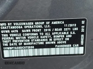 2013 Volkswagen Passat SE w/Sunroof & Nav with VIN 1VWBP7A33DC072530, listed as a IAAI auction lot 41906797 with 118,110 mi miles. Bid and sale history available at carsss.com. Image 9.