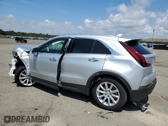 2022 Cadillac XT4 AWD Luxury with VIN 1GYFZBR45NF118075, listed as a Copart auction lot 58654423 with 1,982 mi miles and . Bid and sale history available at carsss.com. Image 2.