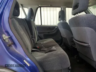 2001 Honda CR-V LX z VIN JHLRD18401C034127, wystawiony jako Copart lot #56577855 z przebiegiem 186 441 mil mil oraz Szkoda całkowita • Salvage title. Historia ofert i sprzedaży dostępna na DreamBid. Obrazek 11.