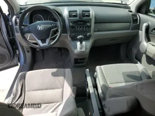2007 Honda CR-V EX z VIN JHLRE485X7C116074, wystawiony jako Copart lot #59938645 z przebiegiem 249 115 mil mil oraz Czysty tytuł • Clean title. Historia ofert i sprzedaży dostępna na DreamBid. Obrazek 8.