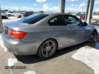 2011 BMW 3 Series 335is with VIN WBAKG1C52BE617713, listed as a Copart auction lot 74064204 with 132,742 mi miles and Salvage Title. Bid and sale history available at carsss.com. Image 3.