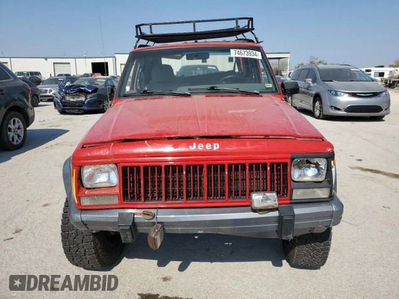 1996 Jeep Cherokee Country with VIN 1J4FJ78S9TL130605, listed as a Copart auction lot 74673934 with 196,857 mi miles and Salvage Title. Bid and sale history available at carsss.com. Image 5.