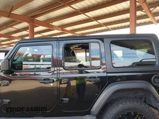 2019 Jeep Wrangler Unlimited Sport S with VIN 1C4HJXDN2KW630780, listed as a IAAI auction lot 41817573 with 56,113 mi miles. Bid and sale history available at carsss.com. Image 14.