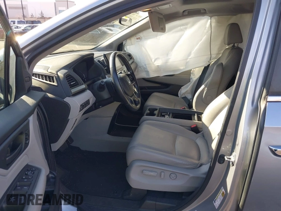 2018 Honda Odyssey EX-L with VIN 5FNRL6H71JB089289, listed as a IAAI auction lot 41813322 with 94,933 mi miles and . Bid and sale history available at DreamBid. Image 5.