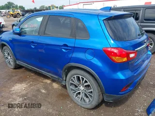 2018 Mitsubishi Outlander SE with VIN JA4AR3AW6JU000961, listed as a IAAI auction lot 42720633 with 124,554 mi miles and . Bid and sale history available at DreamBid. Image 3.