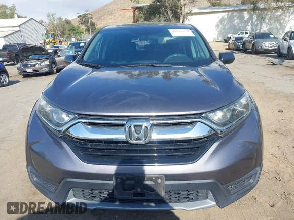 2019 Honda CR-V LX z VIN 2HKRW5H33KH401422, wystawiony jako IAAI lot #42116431 z przebiegiem 119 387 mil mil oraz . Historia ofert i sprzedaży dostępna na DreamBid. Obrazek 13.