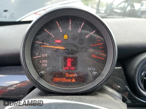 2015 MINI Coupe S z VIN WMWSX3C55FT409449, wystawiony jako Copart lot #66574174 z przebiegiem 99 155 mil mil oraz Szkody całkowita. Historia ofert i sprzedaży dostępna na DreamBid. Obrazek 9.