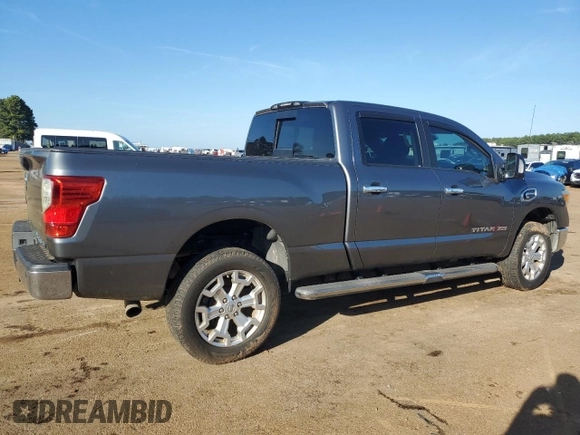 2016 Nissan Titan SL z VIN 1N6BA1F22GN503205, wystawiony jako Copart lot #47024925 z przebiegiem 90 936 mil mil oraz Czysty tytuł • Clean title. Historia ofert i sprzedaży dostępna na DreamBid. Obrazek 3.