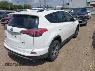 2017 Toyota RAV4 XLE with VIN JTMWFREV8HJ118885, listed as a IAAI auction lot 42097180 with 122,481 mi miles. Bid and sale history available at carsss.com. Image 4.
