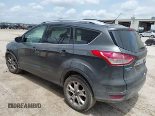 2015 Ford Escape Titanium z VIN 1FMCU0JX3FUA71770, wystawiony jako IAAI lot #42085635 z przebiegiem 141 890 mil mil oraz . Historia ofert i sprzedaży dostępna na DreamBid. Obrazek 3.
