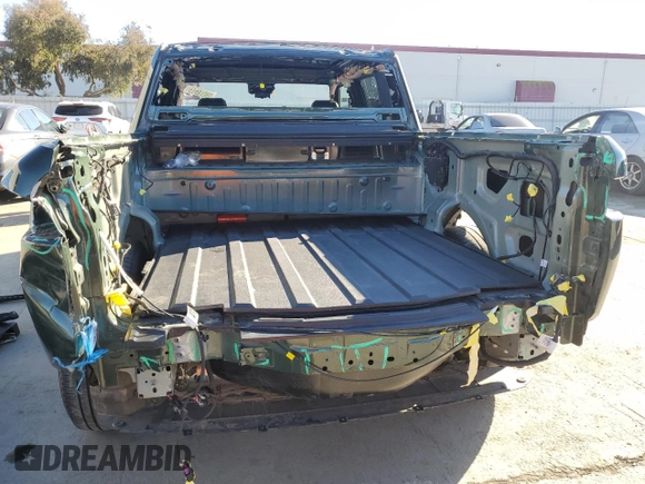 2023 Rivian R1T Adventure with VIN 7FCTGAAA7PN024633, listed as a Copart auction lot 41481365 with 24,965 mi miles and Salvage Title. Bid and sale history available at carsss.com. Image 6.