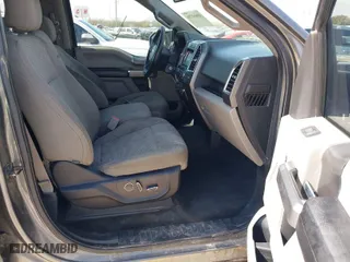 2015 Ford F-150 XLT w/HD Payload Pkg with VIN 1FTFW1EF7FKD04869, listed as a IAAI auction lot 41664736 with 165,784 mi miles. Bid and sale history available at carsss.com. Image 5.