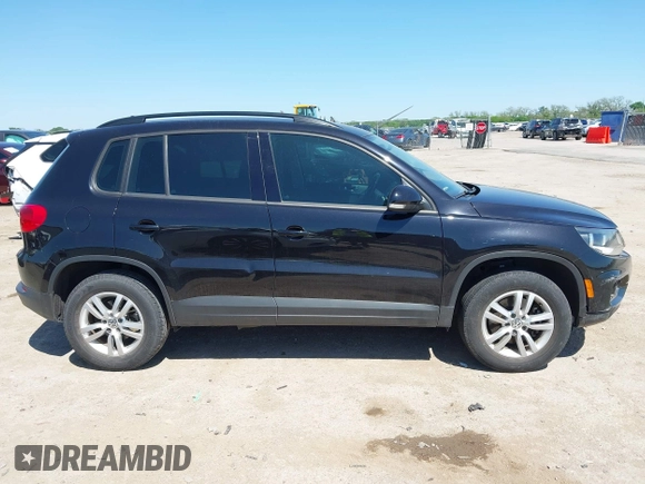 2015 Volkswagen Tiguan SE with VIN WVGAV7AX1FW558855, listed as a IAAI auction lot 42064427 with 58,584 mi miles and . Bid and sale history available at DreamBid. Image 13.