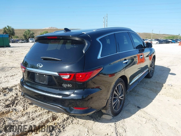 2020 Infiniti QX60 Pure with VIN 5N1DL0MN4LC539573, listed as a IAAI auction lot 42010032 with 104,507 mi miles and . Bid and sale history available at DreamBid. Image 4.