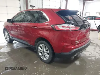 2020 Ford Edge Titanium z VIN 2FMPK4K98LBB39819, wystawiony jako IAAI lot #41947377 z przebiegiem 69 467 mil mil oraz . Historia ofert i sprzedaży dostępna na DreamBid. Obrazek 3.
