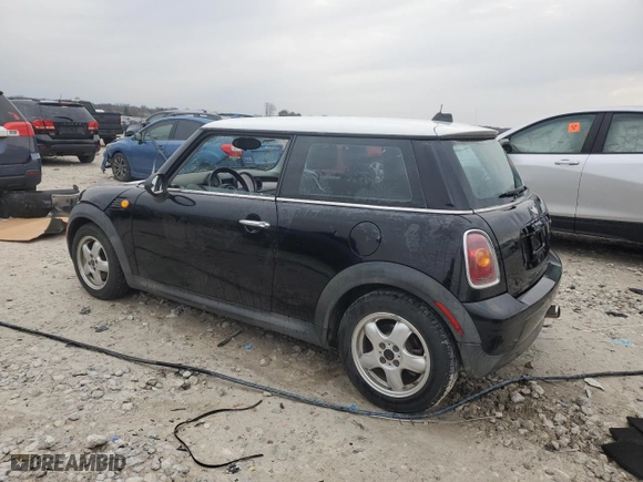 2010 MINI Cooper Hardtop with VIN WMWMF3C59ATU77936, listed as a Copart auction lot 51821835 with 0 mi miles and Clean Title. Bid and sale history available at carsss.com. Image 2.