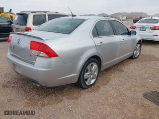 2010 Mercury Milan with VIN 3MEHM0HA8AR633916, listed as a IAAI auction lot 41439384 with 216,109 mi miles. Bid and sale history available at carsss.com. Image 4.