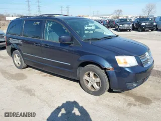 2009 Dodge Grand Caravan SXT with VIN 2D8HN54X19R538798, listed as a IAAI auction lot 41775585 with 100,664 mi miles. Bid and sale history available at carsss.com. Image 1.