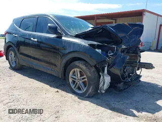 2017 Hyundai Santa Fe 2.4L z VIN 5NMZT3LB1HH041875, wystawiony jako IAAI lot #40633594 z przebiegiem 131 995 mil mil oraz . Historia ofert i sprzedaży dostępna na DreamBid. Obrazek 1.