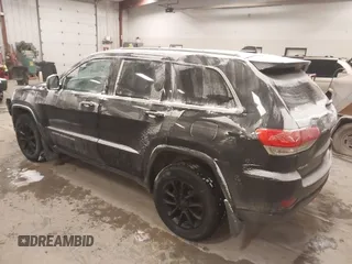 2016 Jeep Grand Cherokee Laredo with VIN 1C4RJFAGXGC311561, listed as a IAAI auction lot 41364024 with 134,042 mi miles. Bid and sale history available at carsss.com. Image 3.