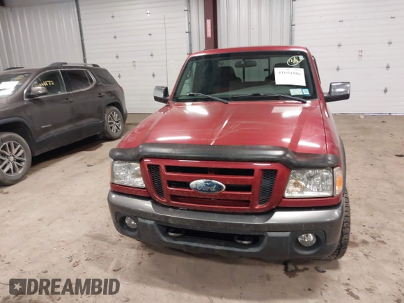 2009 Ford Ranger XLT with VIN 1FTZR45E49PA11760, listed as a IAAI auction lot 41694586 with 56,863 mi miles. Bid and sale history available at carsss.com. Image 12.