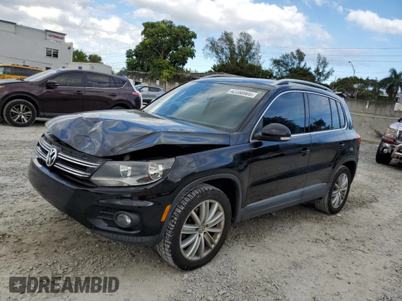 2014 Volkswagen Tiguan SE with VIN WVGAV3AXXEW543245, listed as a Copart auction lot 42288905 with 92,851 mi miles and Salvage title. Bid and sale history available at DreamBid. Image 1.