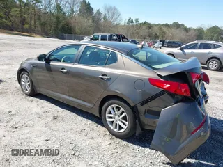 2013 Kia Optima LX with VIN 5XXGM4A77DG157034, listed as a IAAI auction lot 41870513 with 142,433 mi miles and . Bid and sale history available at carsss.com. Image 3.