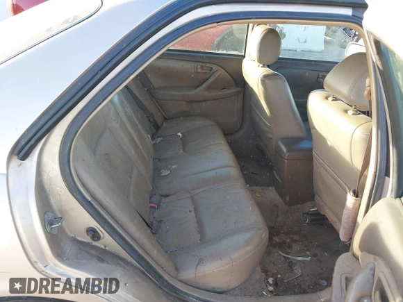 1998 Toyota Camry LE z VIN 4T1BF28K4WU057663, wystawiony jako IAAI lot #41329614 z przebiegiem 145 034 mil mil oraz . Historia ofert i sprzedaży dostępna na DreamBid. Obrazek 8.