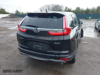 2018 Honda CR-V EX with VIN 7FARW2H51JE030696, listed as a IAAI auction lot 41654439 with 92,705 mi miles. Bid and sale history available at carsss.com. Image 4.