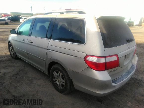 2006 Honda Odyssey EX-L with VIN 5FNRL38616B413712, listed as a IAAI auction lot 39878116 with 228,623 mi miles. Bid and sale history available at carsss.com. Image 3.