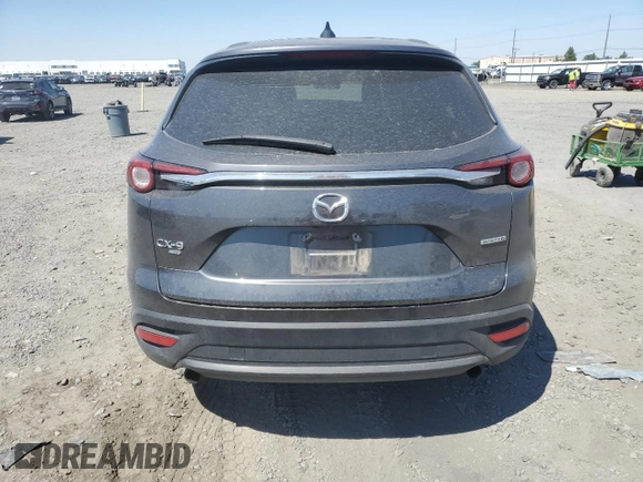 2021 Mazda CX-9 Sport with VIN JM3TCBBY9M0527244, listed as a Copart auction lot 64231384 with Not Provided miles and Salvage Title. Bid and sale history available at DreamBid. Image 6.