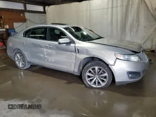 2009 Lincoln MKS z VIN 1LNHM94R39G629594, wystawiony jako Copart lot #56986125 z przebiegiem Nie podano mil oraz Szkoda całkowita • Salvage title. Historia ofert i sprzedaży dostępna na DreamBid. Obrazek 4.