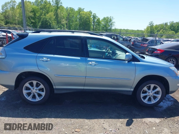 2008 Lexus RX with VIN 2T2HK31U28C057037, listed as a IAAI auction lot 42134779 with 191,968 mi miles. Bid and sale history available at carsss.com. Image 13.