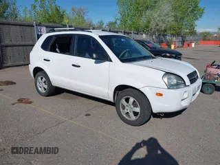 2006 Hyundai Tucson GL with VIN KM8JM72B56U324168, listed as a IAAI auction lot 42146955 with 206,919 mi miles. Bid and sale history available at carsss.com. Image 1.
