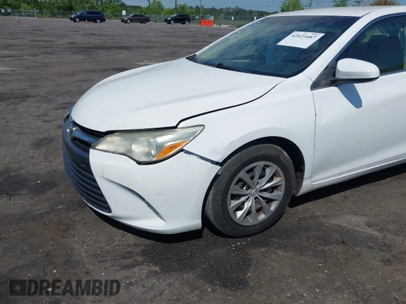 2015 Toyota Camry XLE with VIN 4T1BF1FK6FU948938, listed as a IAAI auction lot 42023487 with 107,232 mi miles. Bid and sale history available at carsss.com. Image 6.