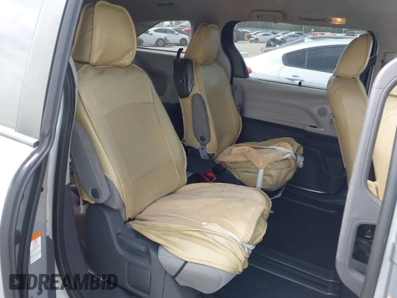 2021 Toyota Sienna LE with VIN 5TDKRKEC5MS010782, listed as a IAAI auction lot 42272827 with 196,844 mi miles and . Bid and sale history available at DreamBid. Image 8.