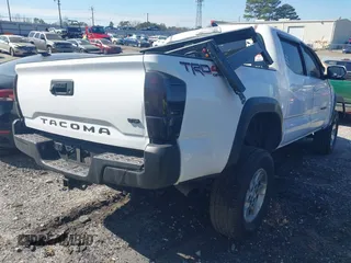 2018 Toyota Tacoma SR with VIN 5TFCZ5AN6JX144056, listed as a IAAI auction lot 41623760 with Not Provided miles and . Bid and sale history available at DreamBid. Image 4.