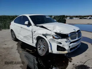 2015 BMW X4 xDrive35i with VIN 5UXXW5C54F0E87831, listed as a Copart auction lot 43763654 with 86,297 mi miles. Bid and sale history available at carsss.com. Image 4.