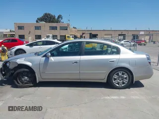 2006 Nissan Altima S with VIN 1N4AL11D56N405498, listed as a IAAI auction lot 42082567 with 228,463 mi miles and . Bid and sale history available at DreamBid. Image 14.
