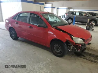 2007 Ford Focus S z VIN 1FAFP34N17W232021, wystawiony jako Copart lot #59553335 z przebiegiem 172 576 mil mil oraz Czysty tytuł • Clean title. Historia ofert i sprzedaży dostępna na DreamBid. Obrazek 4.