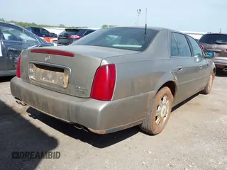 2003 Cadillac DeVille z VIN 1G6KD54Y23U115516, wystawiony jako IAAI lot #42053767 z przebiegiem 132 466 mil mil oraz . Historia ofert i sprzedaży dostępna na DreamBid. Obrazek 4.