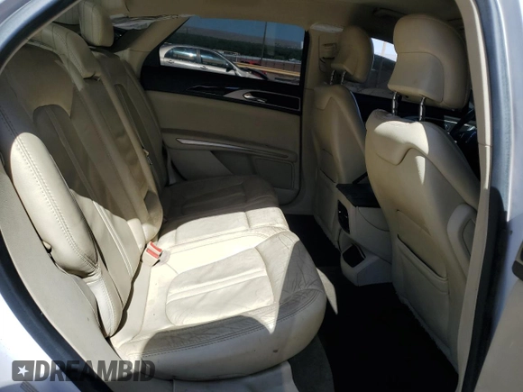 2014 Lincoln MKZ z VIN 3LN6L2G91ER820544, wystawiony jako Copart lot #56049535 z przebiegiem 211 323 mil mil oraz Szkoda całkowita • Salvage title. Historia ofert i sprzedaży dostępna na DreamBid. Obrazek 10.