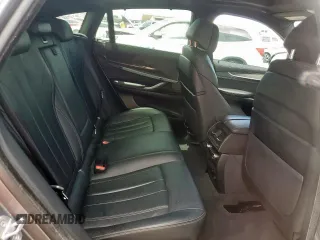 2017 BMW X6 z VIN 5UXKU6C31H0W38581, wystawiony jako Copart lot #58042385 z przebiegiem 124 789 mil mil oraz Tytuł czysty. Historia ofert i sprzedaży dostępna na DreamBid. Obrazek 11.