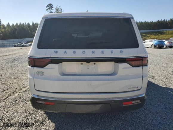 2022 Jeep Wagoneer Series II with VIN 1C4SJUBT6NS115234, listed as a Copart auction lot 77031224 with 46,012 mi miles and Salvage Title. Bid and sale history available at carsss.com. Image 6.