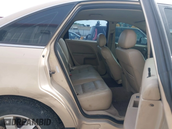 2007 Ford Five Hundred SEL z VIN 1FAFP241X7G119234, wystawiony jako IAAI lot #42142742 z przebiegiem 217 800 mil mil oraz . Historia ofert i sprzedaży dostępna na DreamBid. Obrazek 8.