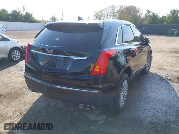 2018 Cadillac XT5 Luxury AWD with VIN 1GYKNDRS6JZ199827, listed as a IAAI auction lot 40699590 with 92,557 mi miles and . Bid and sale history available at DreamBid. Image 4.
