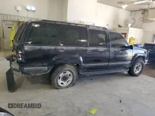 1999 Chevrolet Suburban with VIN 1GNGK26J6XJ444189, listed as a Copart auction lot 68249474 with 216,412 mi miles and Salvage Title. Bid and sale history available at carsss.com. Image 3.